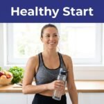 A woman in athletic wear holding a water bottle in a bright kitchen with fresh fruit.