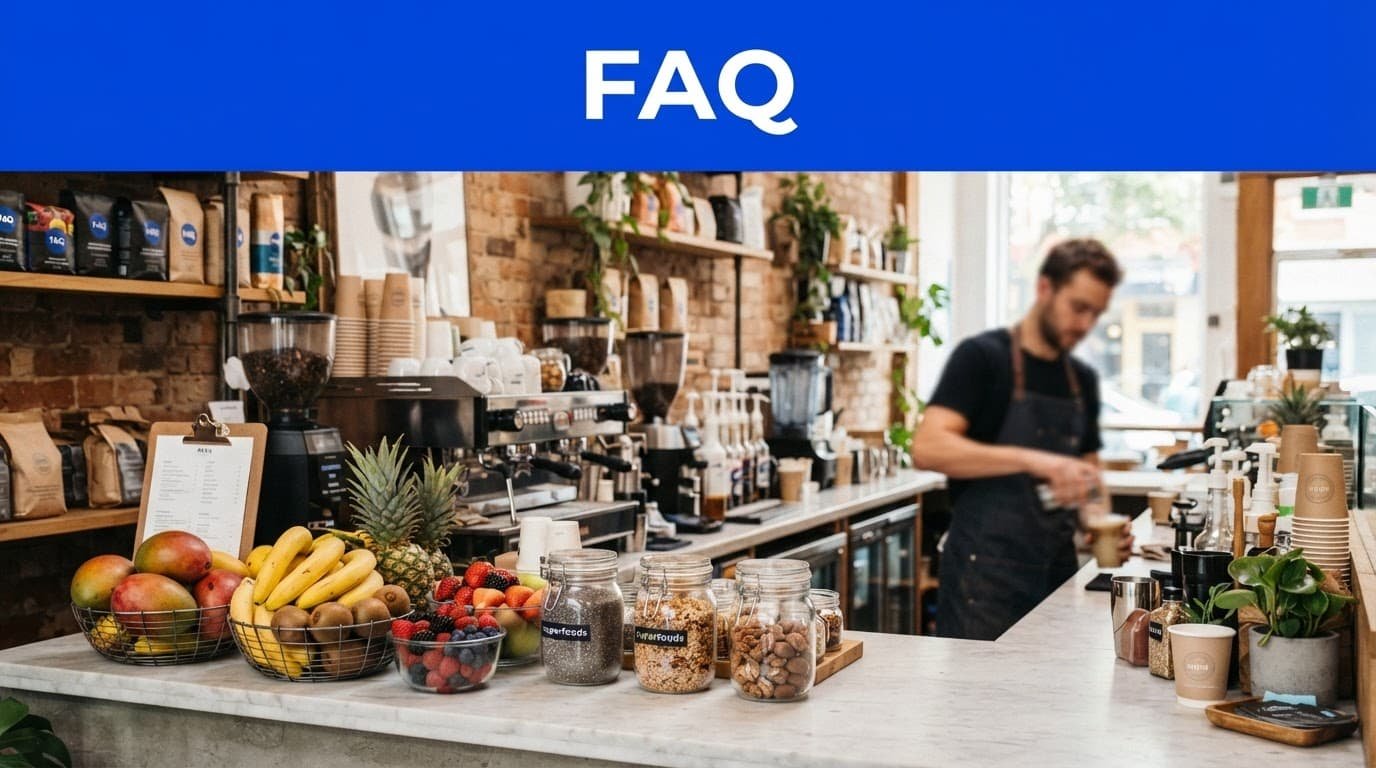 Modern cafe counter with tropical ingredients, a blue FAQ banner, and one blurred person.
